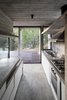 Modern home with Kitchen, Concrete Counter, Laminate Cabinet, Concrete Floor, Concrete Backsplashe, Accent Lighting, and Undermount Sink. Wein House - Besonías Almeida arquitectos Photo 10 of Wein House