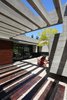 Modern home with Exterior, Wood Siding Material, House, Beach House Building Type, Concrete Siding Material, Metal Siding Material, and Glass Siding Material. S&S House - Besonías Almeida arquitectos Photo 4 of S&S House