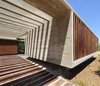 Modern home with Exterior, House, Concrete Siding Material, Metal Siding Material, Glass Siding Material, Wood Siding Material, and Beach House Building Type. S&S House - Besonías Almeida arquitectos Photo 3 of S&S House