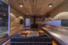 Modern home with Living Room, Coffee Tables, Accent Lighting, Medium Hardwood Floor, and Wood Burning Fireplace. Torcuato House Pavilion - Besonías Almeida arquitectos Photo 13 of Torcuato House Pavilion