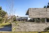 Modern home with Outdoor, Back Yard, Trees, Shrubs, Grass, Gardens, Swimming Pools, Tubs, Shower, and Concrete Patio, Porch, Deck. Torcuato House Pavilion - Besonías Almeida arquitectos Photo 9 of Torcuato House Pavilion