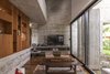 Modern home with Living Room, Chair, Coffee Tables, and Medium Hardwood Floor. Aranzazu House - Besonías Almeida arquitectos Photo 11 of Aranzazu House