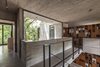 Modern home with Hallway, Medium Hardwood Floor, and Concrete Floor. Aranzazu House - Besonías Almeida arquitectos Photo 16 of Aranzazu House