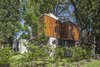 Modern home with Exterior, House, Wood Siding Material, Concrete Siding Material, and Glass Siding Material. Aranzazu House - Besonías Almeida arquitectos Photo 3 of Aranzazu House
