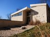 Modern home with Exterior, House Building Type, Metal Roof Material, Concrete Siding Material, and Shed RoofLine. front entry Photo 3 of Leesburg House