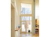 Modern home with Hallway and Light Hardwood Floor. entry interior Photo 9 of Leesburg House