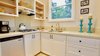 Full Kitchen with Small Fridge, Gas Range, Quartz Counter Photo 10 of Hawaiian Treehouse modern home
