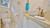 Modern home with Bath Room, Engineered Quartz Counter, Ceramic Tile Floor, Vessel Sink, Open Shower, Ceiling Lighting, Wall Lighting, Ceramic Tile Wall, and Two Piece Toilet. Yes, Treehouses can have toilets that work! Photo 3 of Hawaiian Treehouse
