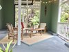 Modern home with Outdoor and Concrete Patio, Porch, Deck. Ground level lounge area for morning coffees or evening wines. Photo 11 of Romantic Tree Cottage in the Hawaiian Rainforest