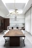 Modern home with Kitchen, Refrigerator, Dishwasher, Quartzite Counter, White Cabinet, Ceramic Tile Floor, Stone Slab Backsplashe, Recessed Lighting, and Accent Lighting. Leonard Street Townhouse Kitchen Photo 8 of Leonard Street Townhouse
