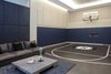 Modern home with Kids Room, Playroom, Vinyl Floor, Pre-Teen Age, and Boy Gender. Leonard Street Townhouse Basketball Court Photo 10 of Leonard Street Townhouse