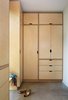 Modern home with Storage Room, Closet Storage Type, and Cabinet Storage Type. view from master bath into master closet Photo 7 of K Street Addition