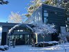 Modern home with Exterior. Winter Mode Photo of Cortes Island Custom Blu Prefab