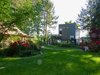 Modern home with Outdoor, Back Yard, Trees, Shrubs, Grass, Hardscapes, and Walkways. Home and Cottage left Photo 7 of Cortes Island Custom Blu Prefab