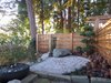 Modern home with Outdoor, Side Yard, Trees, Shrubs, Grass, Gardens, and Boulders. Zen Garden Photo 11 of Cortes Island Custom Blu Prefab