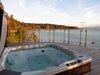 Modern home with Outdoor, Hot Tub Pools, Tubs, Shower, Front Yard, Slope, Wood Patio, Porch, Deck, and Large Patio, Porch, Deck. Hot Tub Photo 16 of Cortes Island Custom Blu Prefab