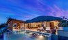 Modern home with Outdoor, Back Yard, Wood Patio, Porch, Deck, Slope, Concrete Patio, Porch, Deck, Wood Fences, Wall, Landscape Lighting, Salt Water Pools, Tubs, Shower, and Infinity Pools, Tubs, Shower. Perched atop a 40m oceanfront cliff in the eco community of Montecito Beach Village in Huatulco, Mexico, the home opens from both the grand palapa and master suite the saltwater infinity pool and the unsurpassed views beyond. Modern melds with traditional in design, materials, craftsmanship, and technology. Local craftsman supply the majority of the home's impeccable finishings and details, yet the villa also embraces modern touches with state of the art kitchen, LED lighting throughout, and a full home Sonos system supplying audiophile sound, both indoors and out. Of course, one can simply chose to just enjoy the sound of the waves. Photo of Esquina Del Cielo