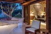 The master suite features amazing ocean views, private patio with direct pool access, and, of course, an essential hammock. Just beyond the patio sits Benjamin, a stubborn 250 year old cactus. The home, like all of Montecito Beach Village sits lightly on the land, respecting the flora and fauna...and Benjamin, whom the home was designed to leave undisturbed. Photo 11 of Esquina Del Cielo modern home