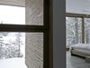 Modern home with Bedroom, Bed, and Concrete Floor. bedroom details: concrete and wood Photo 6 of Eels Lake Cottage