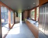 Modern home with Kitchen, Refrigerator, Quartzite Counter, Wood Cabinet, Concrete Floor, Recessed Lighting, and Undermount Sink. interior millwork Photo 8 of Tucker Lake Cottage