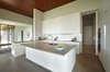 Modern home with Kitchen, Cooktops, White Cabinet, Recessed Lighting, Refrigerator, Undermount Sink, Wall Oven, Quartzite Counter, Concrete Floor, and Engineered Quartz Counter. kitchen details Photo 11 of Stouffville Residence