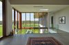 Modern home with Hallway and Concrete Floor. Glazed hallway Photo 12 of Stouffville Residence