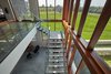 Modern home with Staircase, Concrete Tread, Metal Tread, Glass Railing, and Metal Railing. Feature stair Photo 15 of Stouffville Residence