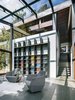 Modern home with Office, Library Room Type, Chair, Limestone Floor, and Shelves. Library Photo 17 of Fall House