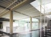 Modern home with Kitchen, Marble Counter, Concrete Floor, Drop In Sink, and White Cabinet. Kitchen area Photo 16 of Tehama Grasshopper