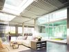 Modern home with Living Room, Chair, Bench, Ceiling Lighting, Sofa, and Concrete Floor. Living room Photo 14 of Tehama Grasshopper