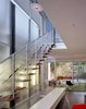 Modern home with Staircase, Metal Tread, Metal Railing, Wood Tread, and Glass Railing. Stairs Photo 13 of 1532 House