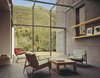 Modern home with Living Room, Chair, Coffee Tables, and Concrete Floor. Living room Photo 8 of Jackson Family Retreat