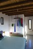 Modern home with Bedroom, Dresser, Wardrobe, Concrete Floor, Storage, Bed, and Bench. interior view of bedroom Photo 7 of the camping house