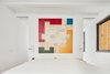 Modern home with Bedroom, Bench, Bed, Pendant Lighting, and Medium Hardwood Floor. Suite bedroom with timber louver Photo 10 of Conversion of a ground-floor publisher’s warehouse into a residence and atelier for an artist-architect couple