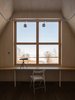 Modern home with Office, Library Room Type, Chair, Medium Hardwood Floor, and Study Room Type. second floor studio Photo 15 of House by the sea by AB CHVOYA