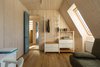 Modern home with Bedroom, Shelves, Medium Hardwood Floor, and Track Lighting. writer's bedroom Photo 10 of House by the sea by AB CHVOYA