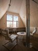Modern home with Office, Medium Hardwood Floor, Chair, Library Room Type, and Study Room Type. second floor studio Photo 12 of House by the sea by AB CHVOYA