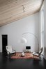 Modern home with Living Room, Chair, Track Lighting, and Ceramic Tile Floor. living room Photo 8 of House for two artists by AB CHVOYA