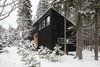 Modern home with Exterior, House Building Type, Wood Siding Material, Shed RoofLine, and Metal Roof Material. Studio northen facade Photo 3 of House for two artists by AB CHVOYA
