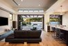 Modern home with Living Room, Medium Hardwood Floor, Ceiling Lighting, Sectional, and Media Cabinet. Indoor-outdoor living spaces Photo 11 of New Perspective