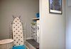Modern home with Bath Room, Ceramic Tile Floor, Laminate Counter, and Light Hardwood Floor. After: bathroom Photo 13 of Young and Fresh Apartment Renovation - Brussels