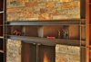 Modern home with Living Room, Sofa, Light Hardwood Floor, Coffee Tables, Standard Layout Fireplace, Chair, and Ceiling Lighting. Detail of folded steel fireplace mantle Photo 7 of DESCHUTES House