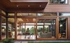 Modern home with Exterior, House, Metal Roof Material, Flat RoofLine, and Wood Siding Material. View of dining & living areas from courtyard Photo 13 of DESCHUTES House
