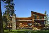 Modern home with Exterior, Shed RoofLine, House, Wood Siding Material, and Metal Roof Material. Exterior view on east side Photo 3 of Mazama House