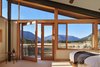 Modern home with Bedroom, Night Stands, Ceiling Lighting, Carpet Floor, and Bed. Master Bedroom with view of meadow and mountains Photo 14 of Mazama House