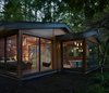 Modern home with Exterior, Shingles Roof Material, Wood Siding Material, Gable RoofLine, and House. Exterior view of master bedroom and master bath Photo 9 of Lake Forest Park Mid Century Renovation