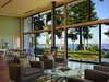 Modern home with Living Room, Sofa, Dark Hardwood Floor, Wood Burning Fireplace, Chair, Coffee Tables, and Ceiling Lighting. Main living space, which feels like an open porch due to the large sliding glass panels Photo 4 of Port Ludlow House