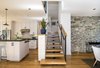 Floating oak slab stairs on custom steel frame Photo 20 of Hillview House modern home