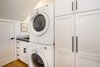 Pantry with laundry room Photo 9 of Hillview House modern home