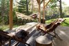 Modern home with Outdoor, Trees, Concrete Patio, Porch, Deck, and Grass. lower terrace Photo 8 of Country House With a Modern Edge